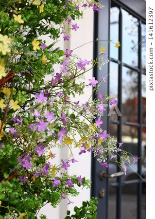 Decoration of facades with artificial flowers. Decoration of facades with artificial flowers. 141612397
