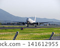 A Boeing 767 passenger plane takes off from Izumo Enmusubi Airport at full power, leaving a trail of heat haze behind it: Izumo City, Shimane Prefecture (Sunny) 141612955