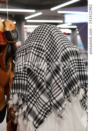 National Arab headscarf on a mannequin. National Arab headscarf on a mannequin. 141612962
