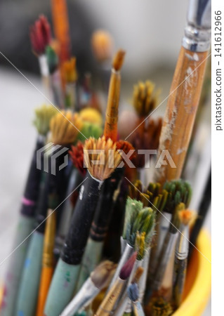 A lot of brushes in the studio of the artist. A lot of brushes in the studio of the artist. 141612966