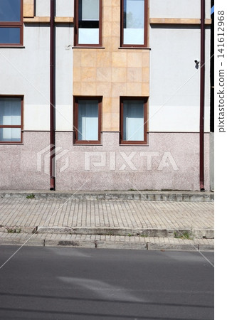 The modern facade of the building. The modern facade of the building. 141612968