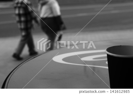A coffee cup made of kraft paper on the table. A coffee cup made of kraft paper on the table. 141612985