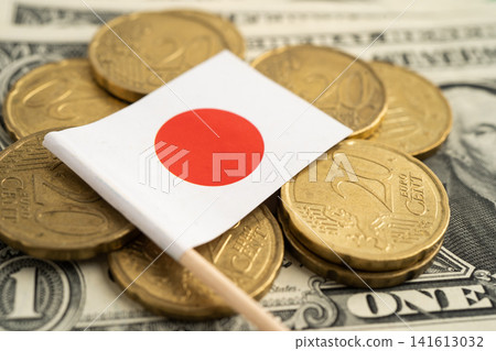 Stack of coins with Japan flag and US dollar banknotes. Stack of coins with Japan flag and US dollar banknotes. 141613032