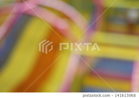 A blurred image of an entertainment center. A blurred image of an entertainment center. 141613068