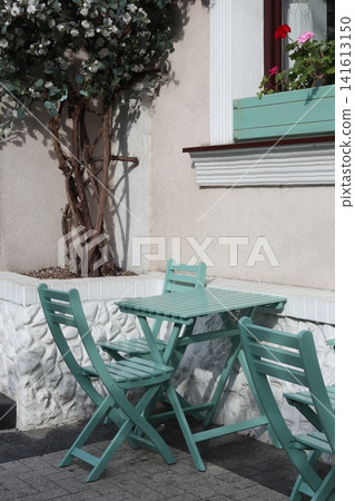 Cozy outdoor cafe in the street. Cozy outdoor cafe in the street. 141613150