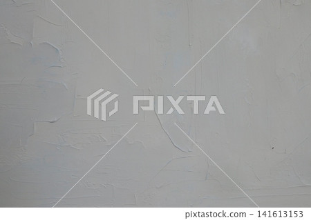 A deliberately rough-plastered wall. Modern aesthetics. Can be used as a background. A deliberately rough-plastered wall. Modern aesthetics. Can be used as a background. 141613153