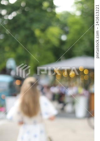 Female figure in the park. Female figure in the park. 141613221