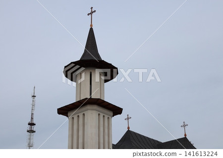 The symbiosis of an industrial building and a church. The symbiosis of an industrial building and a church. 141613224