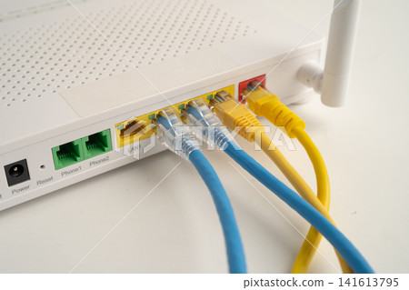 Ethernet cable with wireless router connect to internet service provider network. Ethernet cable with wireless router connect to internet service provider network. 141613795