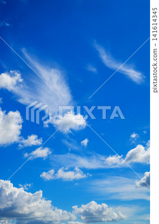 many white cumulus clouds of various sizes against a bright blue sky background many white cumulus clouds of various sizes against a bright blue sky background 141614345