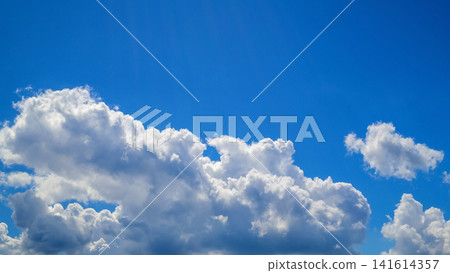 dense volumetric clouds close up under a bright blue sky dome dense volumetric clouds close up under a bright blue sky dome 141614357