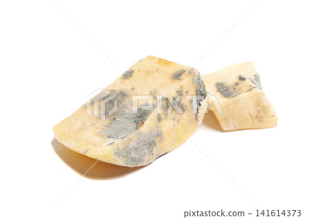 Moldy parmesan cheese isolated on white background Moldy parmesan cheese isolated on white background 141614373