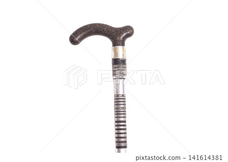 Old walking cane with crook handle isolated on white background Old walking cane with crook handle isolated on white background 141614381
