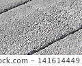 exposed aggregate concrete block pavement texture with stone surface 141614449