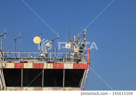 Many of transmitting and radio antenna over Air traffic control tower at international airport. Many of transmitting and radio antenna over Air traffic control tower at international airport. 141615104