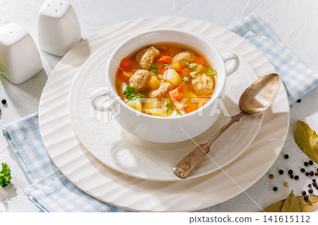 Clear American chicken meatball soup with veggies Clear American chicken meatball soup with veggies 141615112