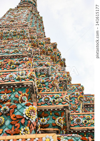 Beautiful Traditional Thai stucco designs on pillars and pagoda, Thai art, texture pillar at pagoda, Temple and palace. Beautiful Traditional Thai stucco designs on pillars and pagoda, Thai art, texture pillar at pagoda, Temple and palace. 141615177