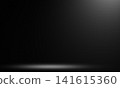 Minimal black background with subtle spotlight and illuminated floor Minimal black background with subtle spotlight and illuminated floor 141615360