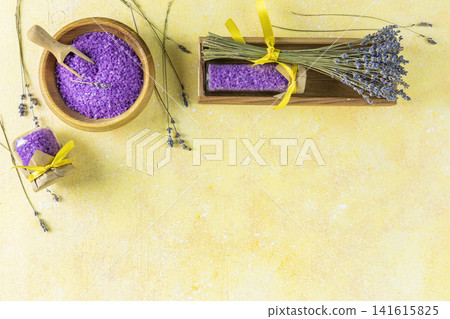 Organic cosmetics with lavender on yellow background, top view Organic cosmetics with lavender on yellow background, top view 141615825