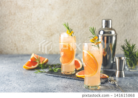 Paloma cocktail tequila fresh grapefruit juice combined and rosemary. Festive drink is ideal for brunch, parties and holidays. Paloma cocktail tequila fresh grapefruit juice combined and rosemary. Festive drink is ideal for brunch, parties and holidays. 141615868
