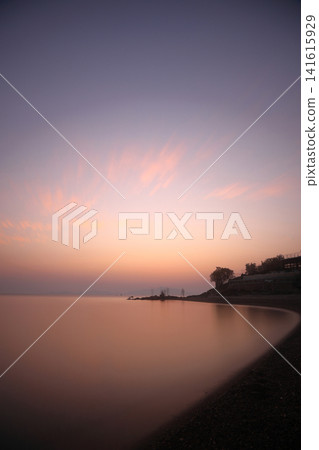 sunset on the beach. Seaside town of Turgutreis and spectacular sunsets. Selective Focus. Long Exposure shoot. tranquility scene. sunset on the beach. Seaside town of Turgutreis and spectacular sunsets. Selective Focus. Long Exposure shoot. tranquility scene. 141615929