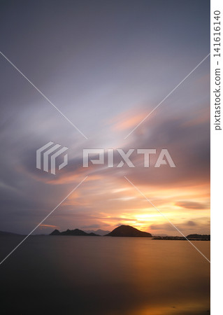 sunset on the beach. Seaside town of Turgutreis and spectacular sunsets. Selective Focus. Long Exposure shoot. tranquility scene. sunset on the beach. Seaside town of Turgutreis and spectacular sunsets. Selective Focus. Long Exposure shoot. tranquility scene. 141616140