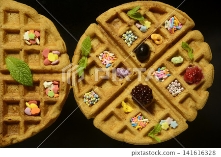 A close-up, overhead view of a waffle. A close-up, overhead view of a waffle. 141616328
