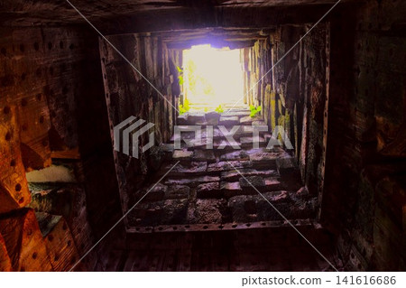 Mysterious light shining into the Gopla at Ta Prohm Temple Mysterious light shining into the Gopla at Ta Prohm Temple 141616686