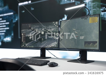 Close up of screens in military command center detecting incoming ballistic missiles. Surveillance interface on PC monitoring enemy movement during defensive operation Close up of screens in military command center detecting incoming ballistic missiles. Surveillance interface on PC monitoring enemy movement during defensive operation 141616975