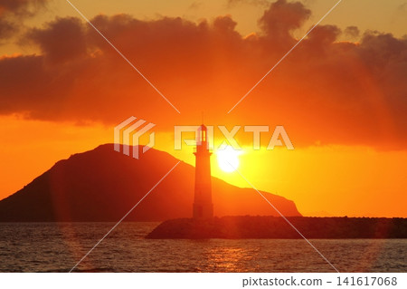 Seascape at sunshine. Lighthouse and sailings on the coast. Seaside town of Turgutreis and spectacular sunshine 141617068