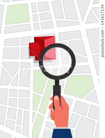hand holding magnifying glass searching building location on city map hand holding magnifying glass searching building location on city map 141617134