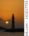 Seascape at sunshine. Lighthouse and sailings on the coast. Seaside town of Turgutreis and spectacular sunshine 141617793