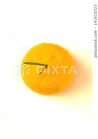 Top view of healthy mochi dessert shaped like mandarin orange on white background with copy space low calorie dairy lactose vegetarian sweets Top view of healthy mochi dessert shaped like mandarin orange on white background with copy space low calorie dairy lactose vegetarian sweets 141618723
