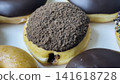 chocolate cake with icing sugar 141618728