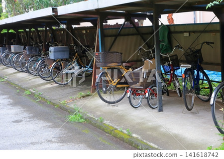 Bicycle parking area in the housing complex Bicycle parking area in the housing complex 141618742