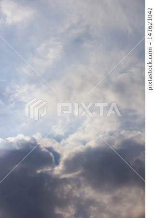 It is a cloudy late afternoon sky. It is a cloudy late afternoon sky. 141621042