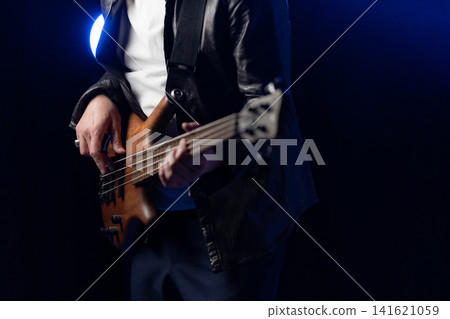 Senior man playing bass Senior man playing bass 141621059