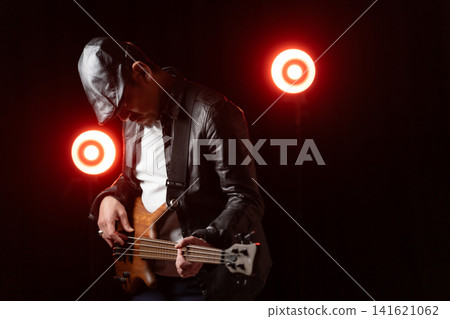 Senior man playing bass Senior man playing bass 141621062