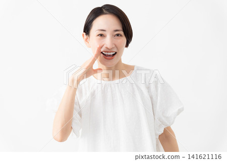 A woman wearing a white blouse - Lifestyle image 141621116