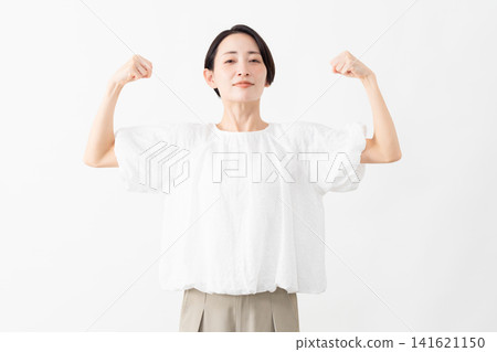 A woman wearing a white blouse - Lifestyle image A woman wearing a white blouse - Lifestyle image 141621150