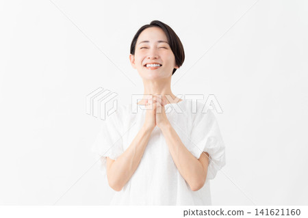 A woman wearing a white blouse - Lifestyle image A woman wearing a white blouse - Lifestyle image 141621160
