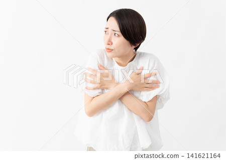 A woman wearing a white blouse - Lifestyle image A woman wearing a white blouse - Lifestyle image 141621164