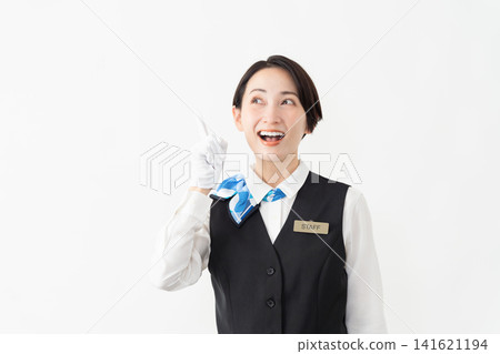 A female attendant in uniform; travel image 141621194