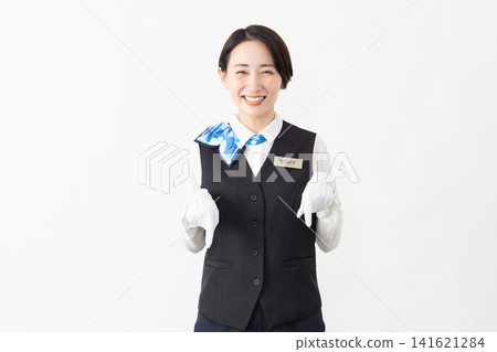 A female attendant in uniform; travel image A female attendant in uniform; travel image 141621284