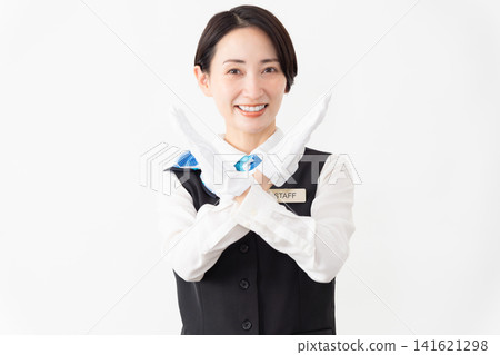 A female attendant in uniform; travel image A female attendant in uniform; travel image 141621298