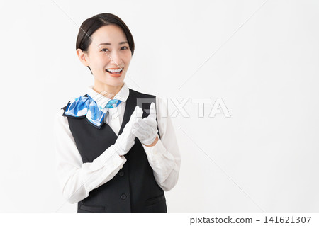 A female attendant in uniform; travel image A female attendant in uniform; travel image 141621307