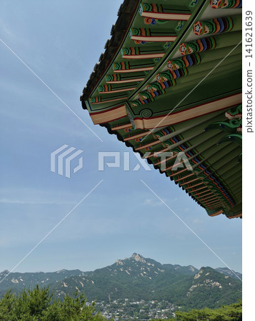 A Seoul landscape featuring mountains and the sky. A Seoul landscape featuring mountains and the sky. 141621639