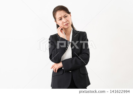 Senior woman in a suit: Business image Senior woman in a suit: Business image 141622994