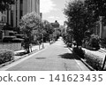 A monochrome streetscape overlooking lush tree-lined streets and university campuses in Ochanomizu, Tokyo. 141623435