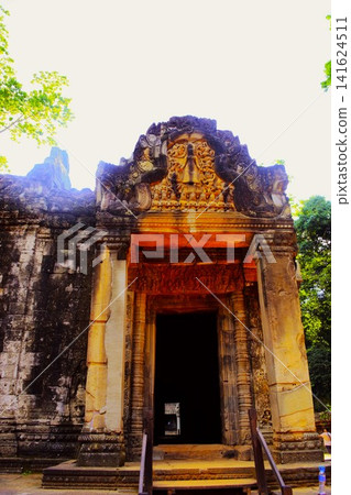 Stone corridor entrance to Ta Prohm Temple in the Angkor Archaeological Park Stone corridor entrance to Ta Prohm Temple in the Angkor Archaeological Park 141624511
